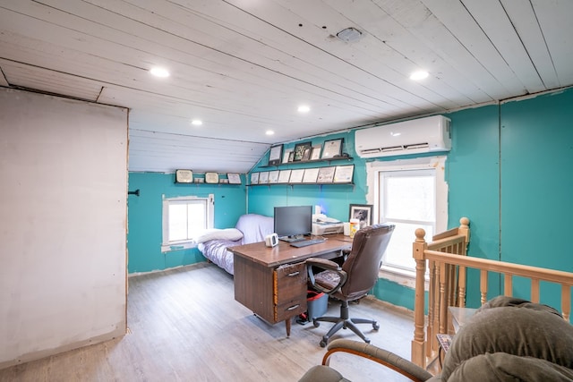 office featuring light hardwood / wood-style flooring, wooden ceiling, an AC wall unit, and vaulted ceiling