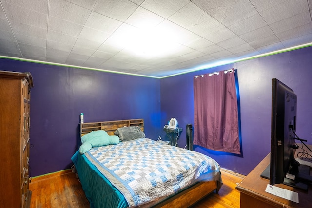 bedroom featuring hardwood / wood-style floors