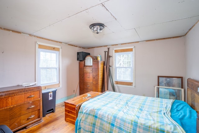 bedroom with light hardwood / wood-style flooring