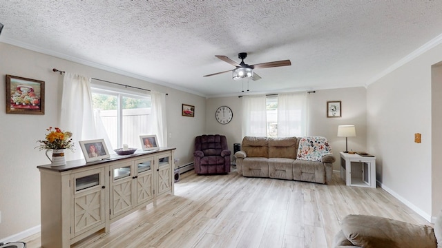 living room with ceiling fan, ornamental molding, a healthy amount of sunlight, and light wood-type flooring