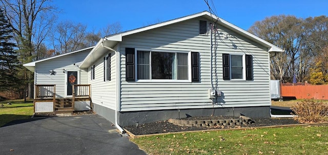 view of home's exterior featuring a lawn