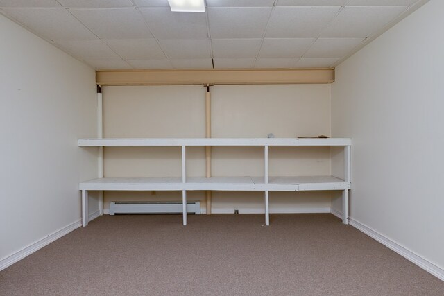 storage room with a baseboard radiator