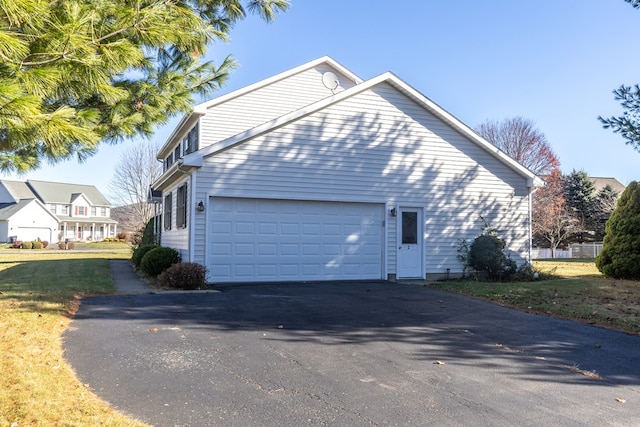 view of property exterior with a garage