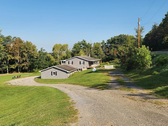 exterior space featuring a front yard