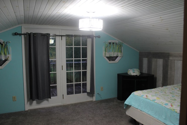 bedroom featuring carpet floors, vaulted ceiling, and wooden ceiling