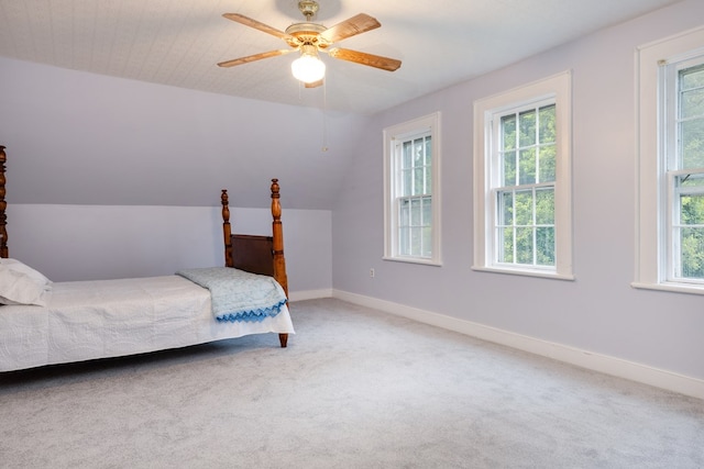 bedroom with vaulted ceiling, carpet, and ceiling fan