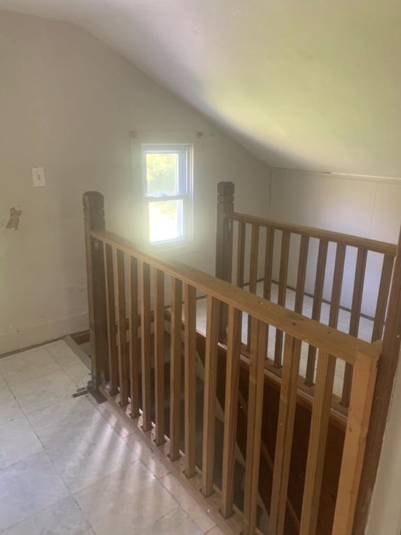 interior space featuring lofted ceiling