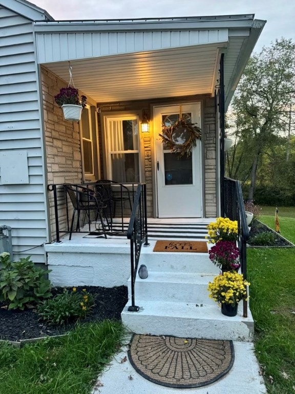 property entrance with a porch