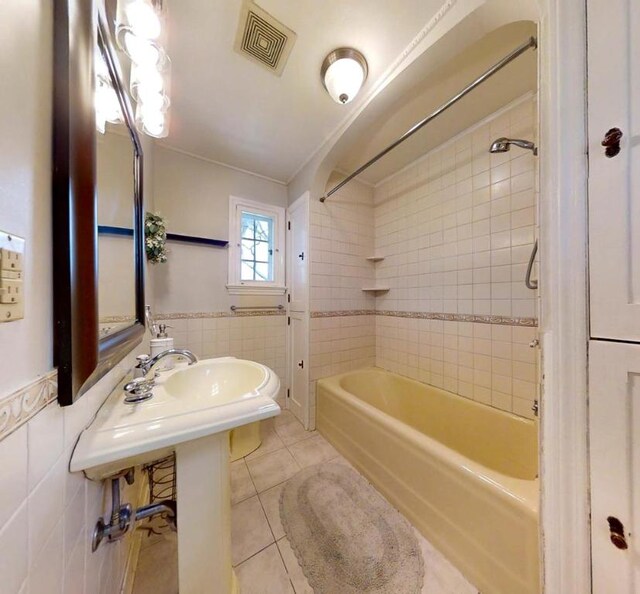 188 Upper Delevan Ave, Corning-City, NY 14830 - full bathroom with tile patterned flooring, tile walls, and shower / washtub combination