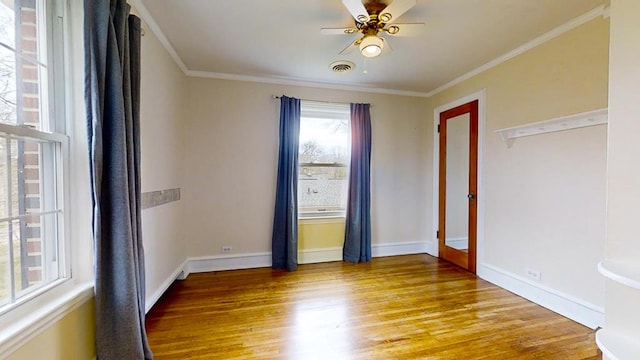 188 Upper Delevan Ave, Corning-City, NY 14830 - spare room featuring light wood-type flooring, a ceiling fan, ornamental molding, and baseboards