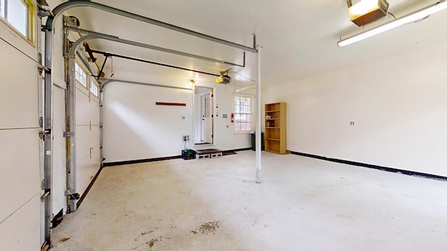 188 Upper Delevan Ave, Corning-City, NY 14830 - garage with a garage door opener and baseboards