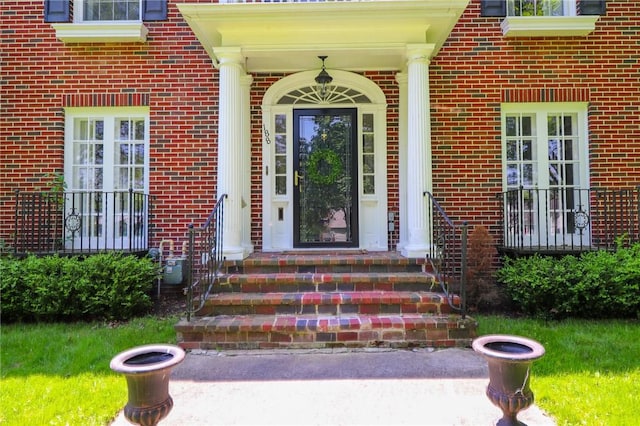188 Upper Delevan Ave, Corning-City, NY 14830 - view of exterior entry featuring brick siding