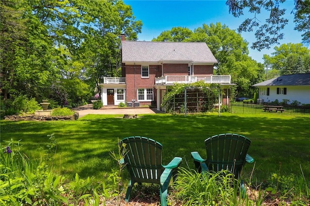 188 Upper Delevan Ave, Corning-City, NY 14830 - rear view of house with a balcony and a chimney