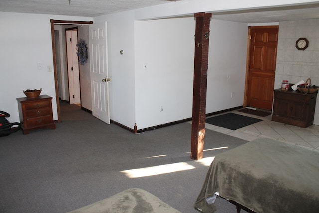 bedroom featuring light carpet