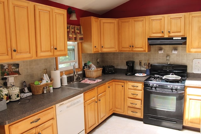 kitchen featuring lofted ceiling, sink, dishwasher, tasteful backsplash, and gas stove