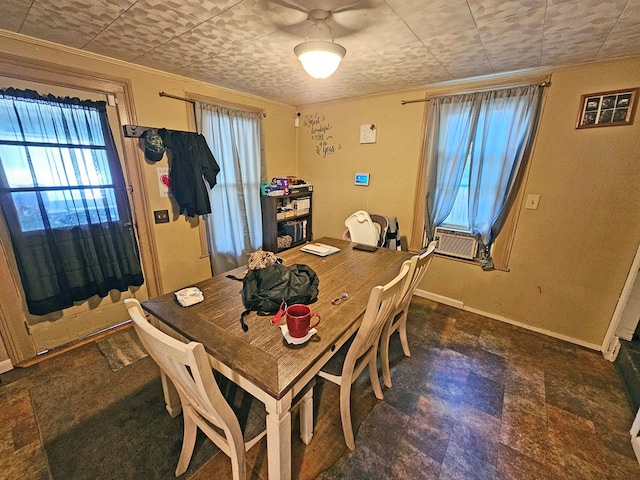 dining space with cooling unit and ornamental molding