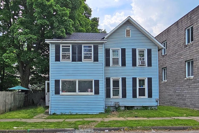 view of front of property with a front lawn