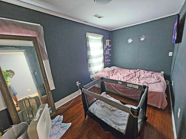 bedroom with dark wood-type flooring