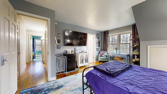 bedroom featuring wood-type flooring