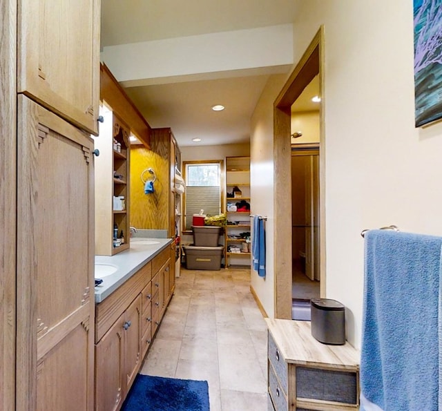 bathroom with vanity and tile patterned floors