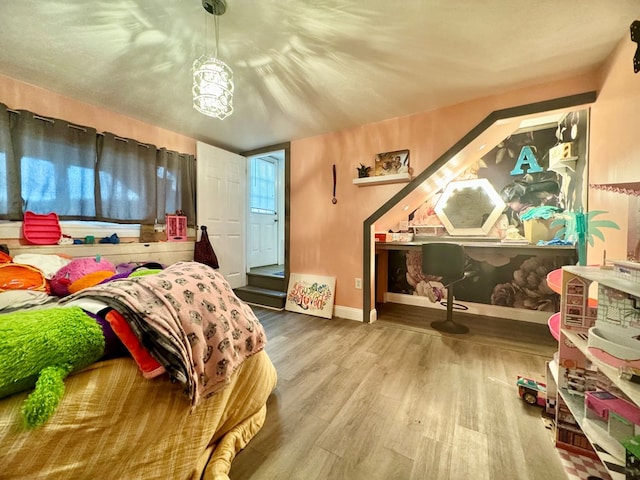 bedroom featuring wood-type flooring