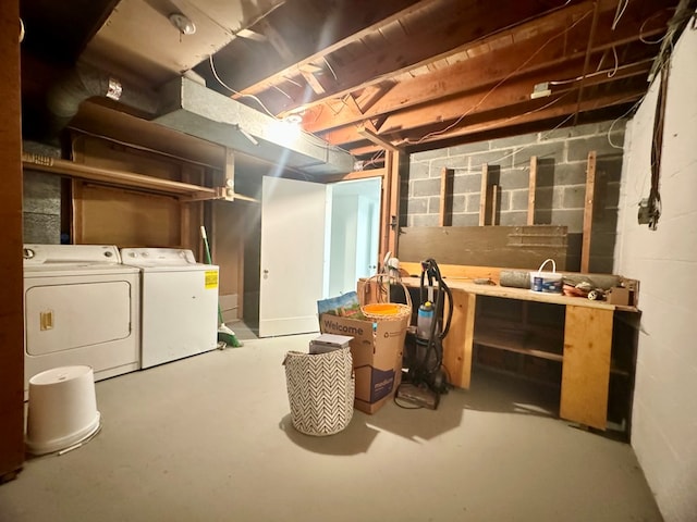 basement with washing machine and clothes dryer