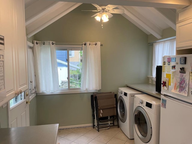 clothes washing area with washing machine and dryer, ceiling fan, and light tile patterned flooring