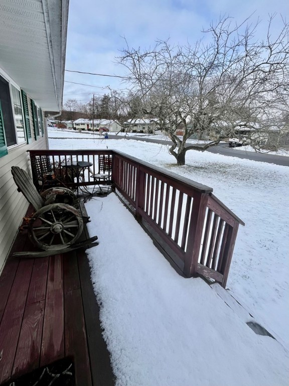 view of snow covered deck