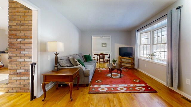 living room with hardwood / wood-style floors