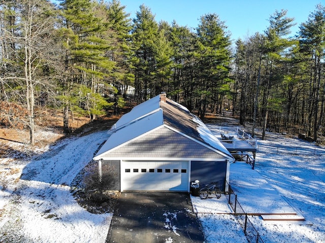 view of snow covered garage