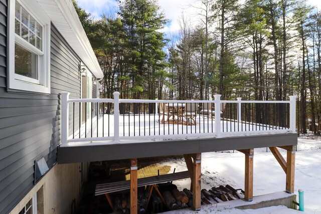 view of snow covered deck