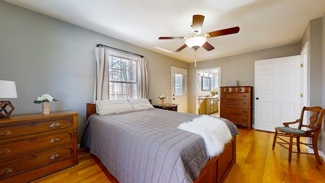 bedroom with light wood-type flooring and ceiling fan