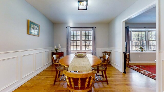 dining space featuring light hardwood / wood-style flooring