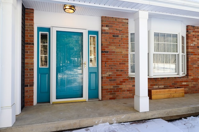 property entrance with a porch