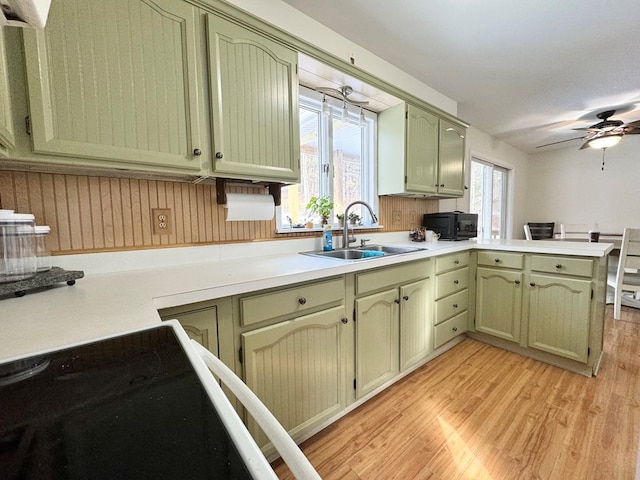 kitchen with green cabinetry