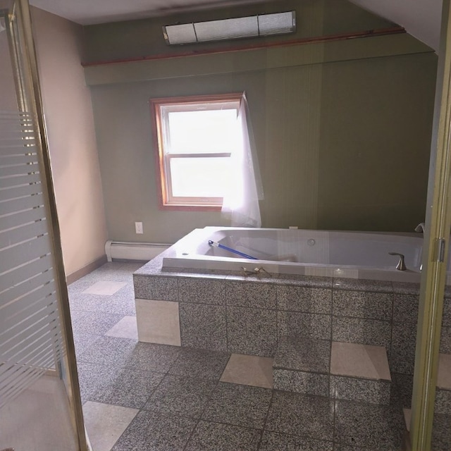 bathroom featuring a baseboard heating unit