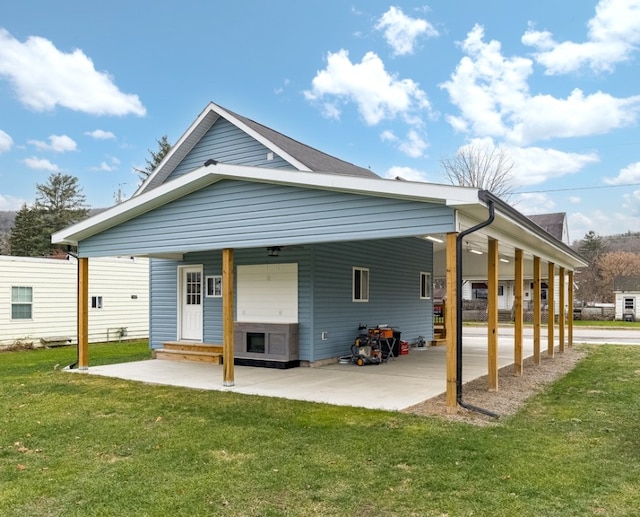 back of house with a yard