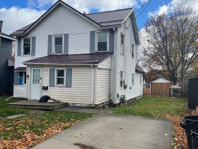 front of property with a front yard