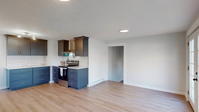 kitchen with wall chimney range hood, light hardwood / wood-style flooring, baseboard heating, stainless steel range with electric stovetop, and backsplash