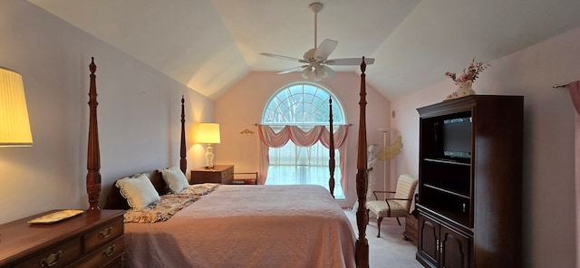 bedroom with lofted ceiling, light colored carpet, and ceiling fan