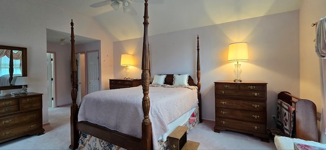 bedroom featuring light carpet and lofted ceiling