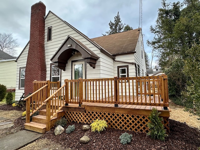 view of front of home with a wooden deck