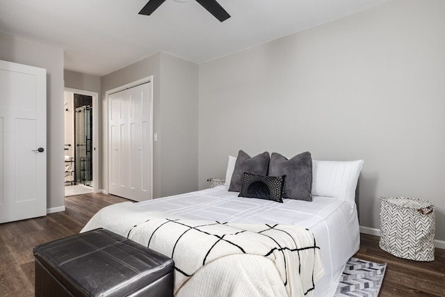 bedroom with dark hardwood / wood-style flooring, ceiling fan, and a closet