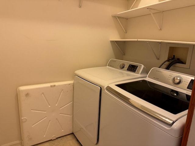 laundry area featuring independent washer and dryer