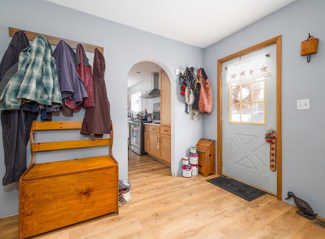 entryway with light hardwood / wood-style flooring