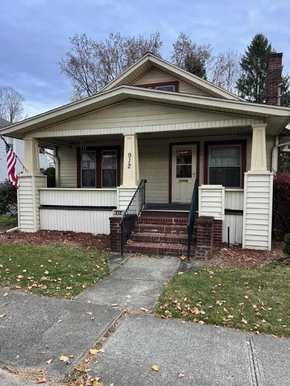 bungalow-style house with a porch