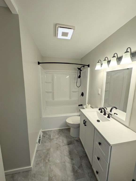 full bathroom with shower / tub combination, vanity, and toilet