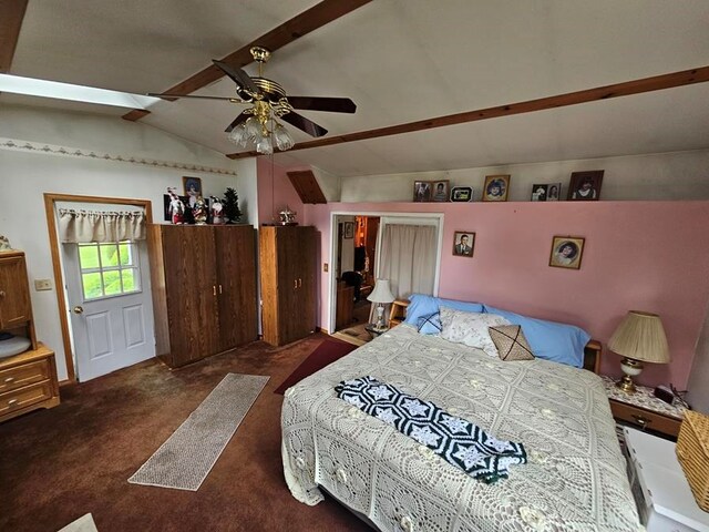 bedroom with vaulted ceiling with beams, dark carpet, a closet, and ceiling fan