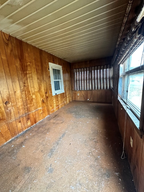 interior space featuring wood walls