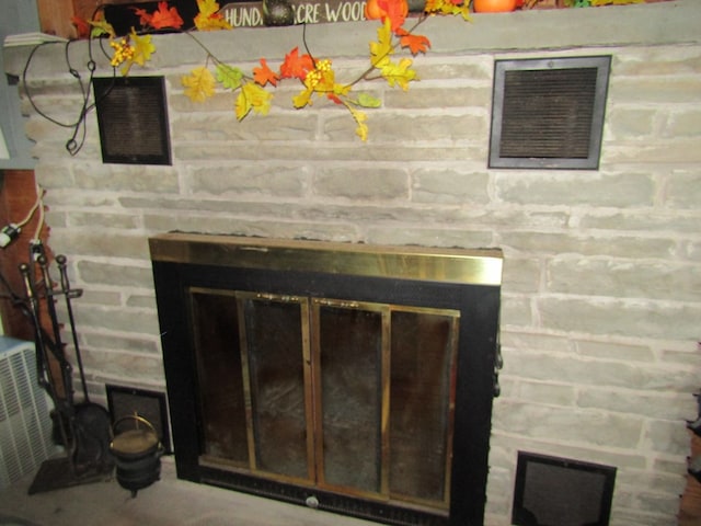 interior details featuring a fireplace